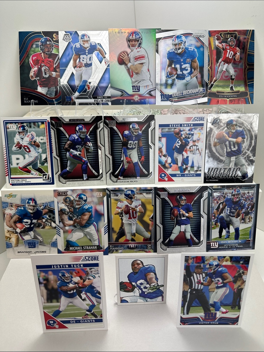 Eli Manning w/ Giants teammates lot of 18 Beckham Jr, Cruz, Strahan, Tuck, Nicks